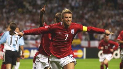 David Beckham celebrates after scoring a penalty for England against Argentina