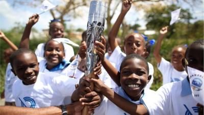 Queen's baton held by children in Barbados