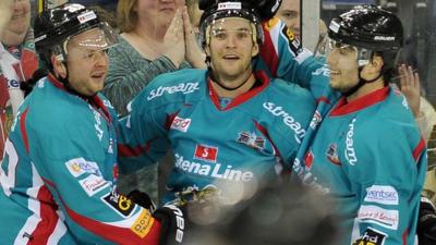 Gareth Roberts, Darryl Lloyd and Mark Garside celebrate victory over Hull