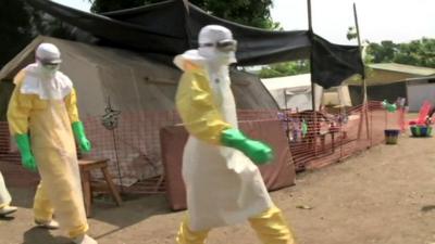 Health workers in protective clothing