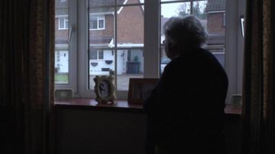 Kathleen Yeoman standing by a window