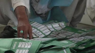 Pile of ballot papers on floor