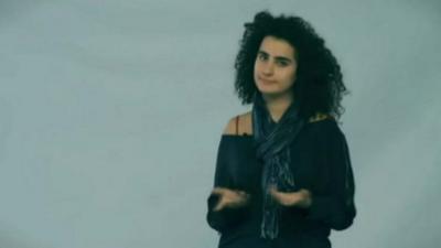 A Lebanese activist campaigning against racism in the video