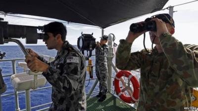 Military personnel on board ship