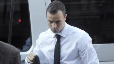 Oscar Pistorius arrives in court on 11 April