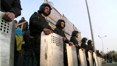 Men with shields at a pro-Kiev rally