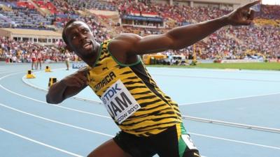 Jamaica's Usain Bolt celebrates after winning the men's 4x100m relay final at the 2013 IAAF World Championships in Moscow on 18 August