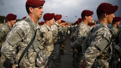 150 U.S. paratroopers from the U.S. Army's 173rd Infantry Brigade Combat Team based in Italy attend a welcoming ceremony as they arrive to participate in training exercises with the Polish army in Swidwin, northern west Poland April 23, 2014.