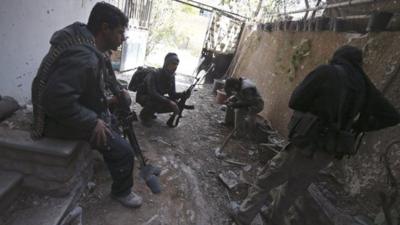 Fighters from the Free Syrian Army in the Mleha suburb of Damascus