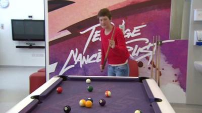 Nicolle playing snooker