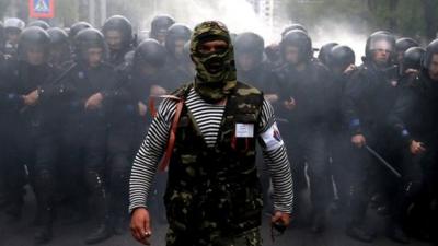 Pro-Russian protestor and riot police, Donetsk