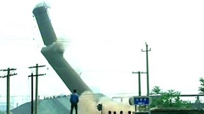 A chimney is demolished in China