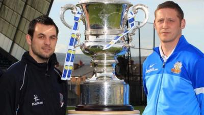 Jim Ervin of Ballymena United with Kris Lindsay of Glenavon