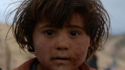 An Afghan villager looks on in Argo district of Badakhshan province on May 3, 2014