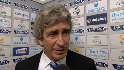 Manager Manuel Pellegrini praises Manchester City's character after their "very tough" 3-2 win over Everton moves them top of the Premier League table.