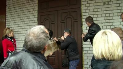 Activists storm Odessa police station