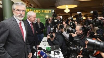 Sinn Fein President Gerry Adams arrives at a news conference after he was released from police detention, in Belfast, May 4, 2014