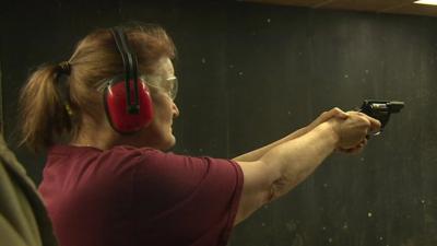 Woman at a shooting range