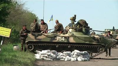 Ukrainian troops with tank