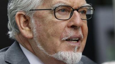 Entertainer Rolf Harris arrives at Southwark Crown Court in London May 9, 2014