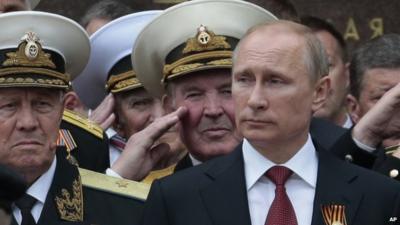 Russian President Vladimir Putin attends a parade marking the Victory Day in Sevastopol, Crimea