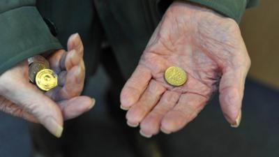 Elderly person with money