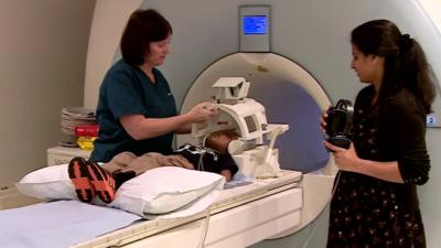 Child being prepared for a brain scan