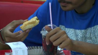 Man eating fast food in India