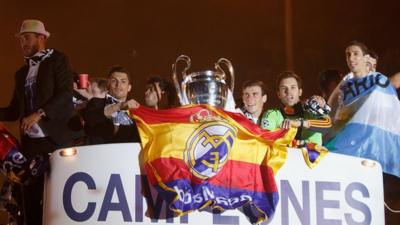 Real Madrid return to hero's welcome