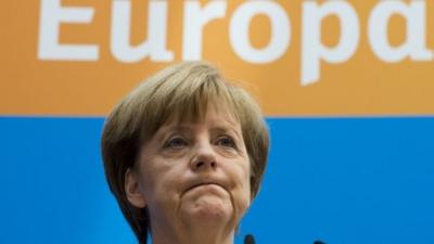 German Chancellor and leader of the Christian Democratic Union (CDU) Angela Merkel addresses a press conference at the CDU headquarters