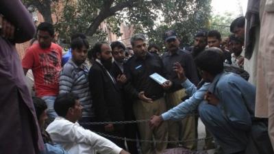 Police collect evidence near body of Farzana Iqbal