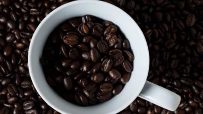 Coffee beans in a mug