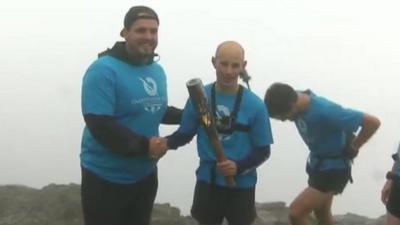 Aled Davies with a runner from Eryri Harriers