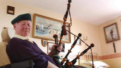 Piper Bill Millin at his home in Dawlish, Devon in 2004