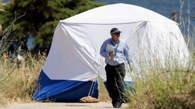 Scotland Yard detective works on an area in Praia da Luz