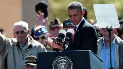 Obama applauds