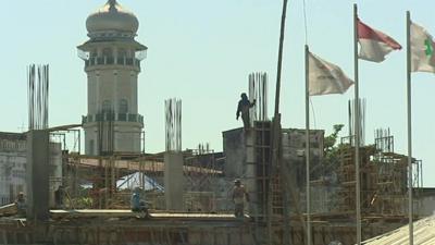 Builders working on construction project