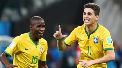 Players celebrate Brazil's goal