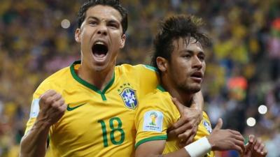 Hernanes and Neymar celebrate Brazil's second goal against Croatia