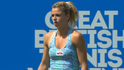 Italy's Camila Giorgi wins a thrilling rally against Victoria Azarenka during their first round match at Eastbourne