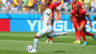 Algeria's Sofiane Feghouli gives his side the lead from the spot against Belgium