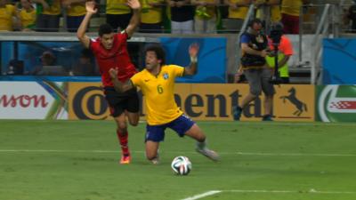 Brazil's Marcelo dives aginst Mexico