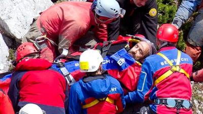 An injured German caver