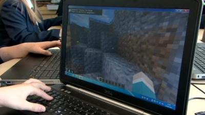 Pupil playing Minecraft