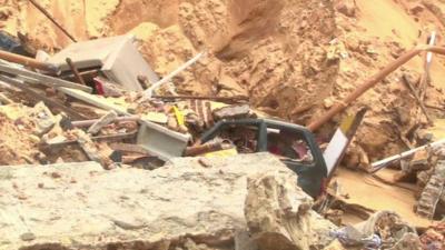 Car in sinkhole