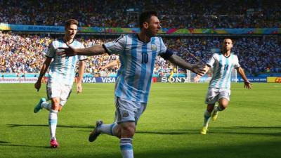 Argentina's Lionel Messi celebrate's scoring against Iran