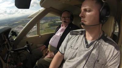 Mike Warren, left, and pilot Colin Granton