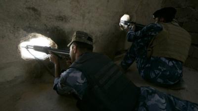 Iraqi security forces on patrol looking for ISIL militants