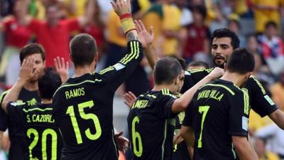 Spain beat Australia 3-0 in Group B