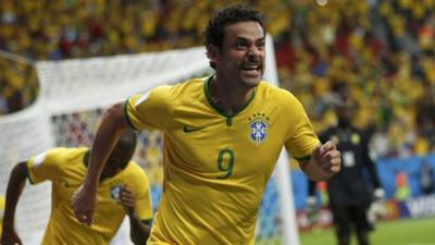 Brazil's Fred celebrates goal against Cameroon